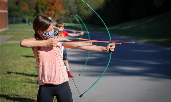 Student fires an arrow